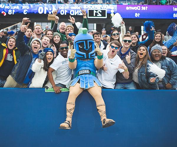 argie the argonaut cheering on uwf with students at the national championship